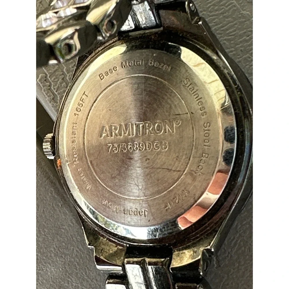 Armitron Womens Purple Dial Crystal Accented Gunmetal Watch 73/3689DGB 165FT